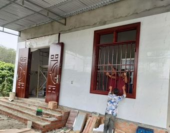 Nhà Chị Hoàng Mỹ Mai lắp cửa đi và cửa sổ 2 cánh tại Cư Jut
