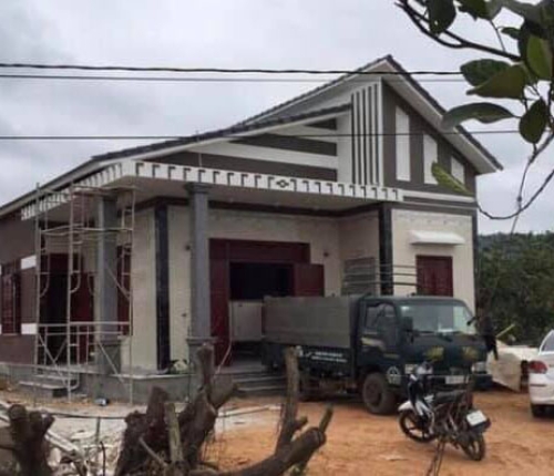Nhà Anh Trần Bình lắp cửa đi 4 cánh và cửa sổ 2 cánh thép vân gỗ