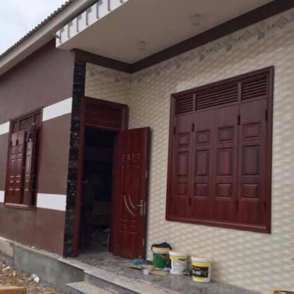 Mẫu cửa sổ 4 cánh bằng thép vân gỗ có chấn song f32 Đắk Lắk